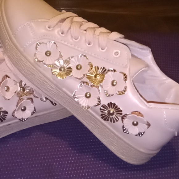 These are Shoes I bought for my daughter but she never ended up wearing them. - Picture 2 of 3